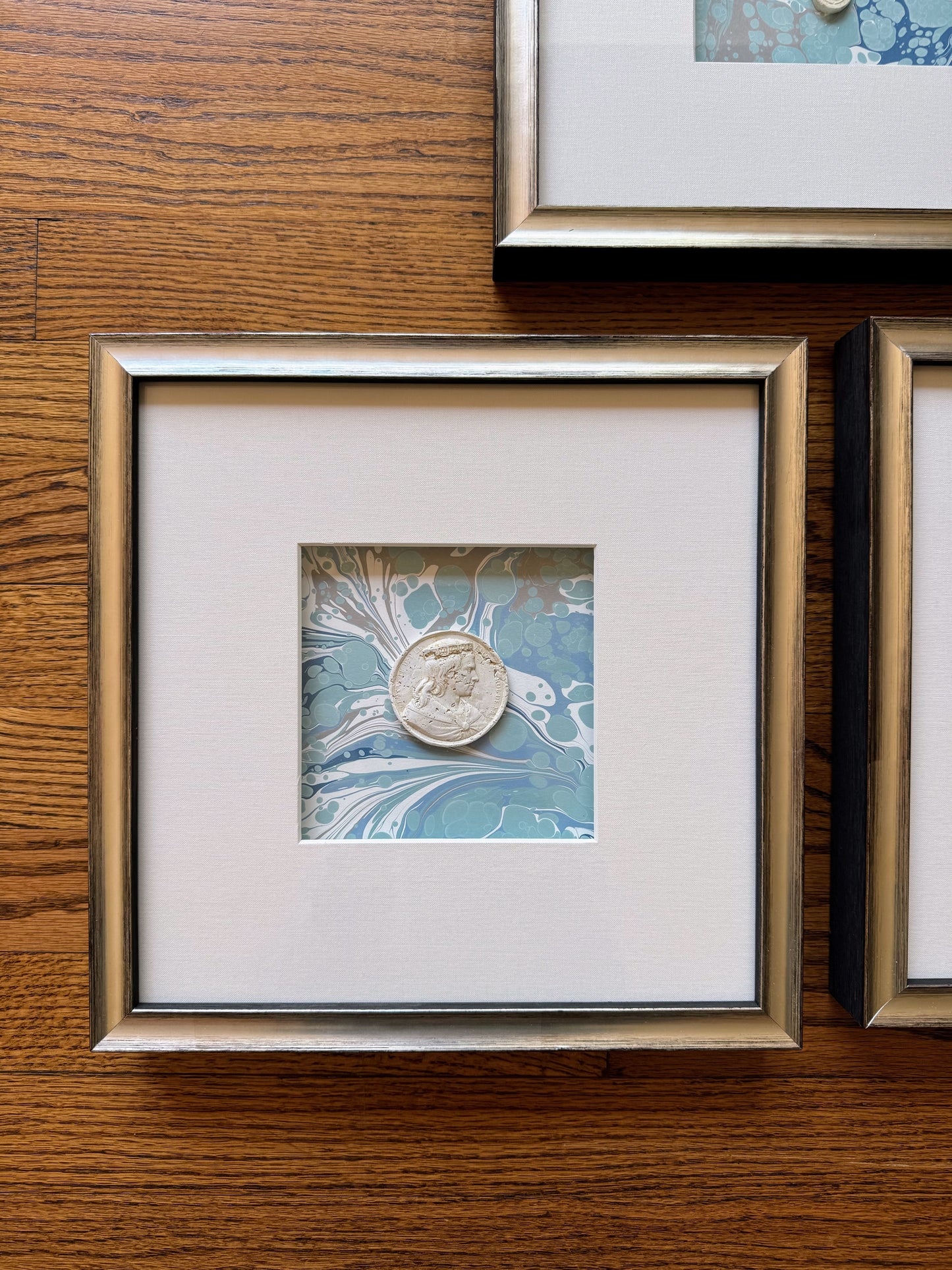 Framed Intaglios Mounted on Marbled Paper